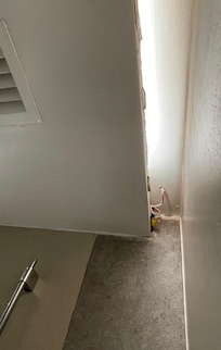 Exposed electrical wiring right above your head in the shower. Significant hazard!