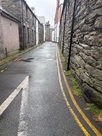 Narrow road to walk to the rear of hotel