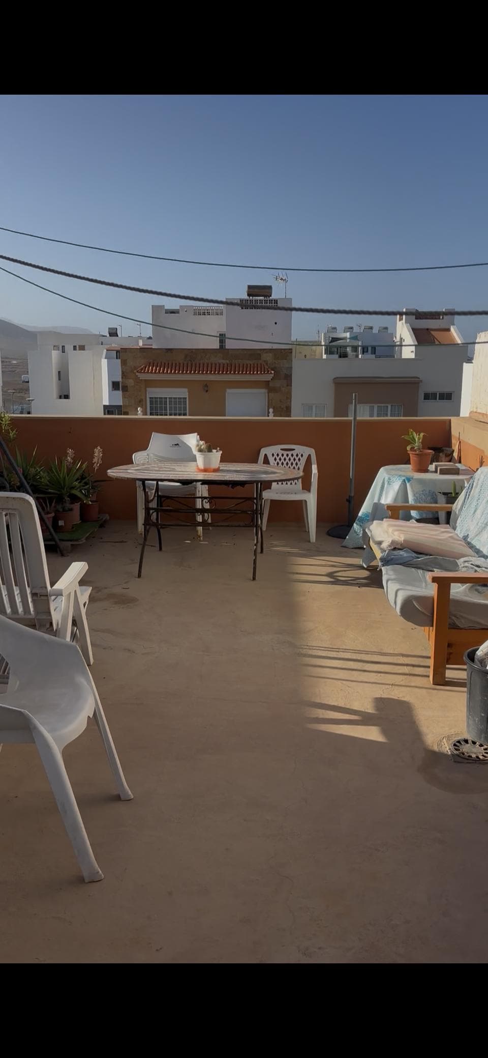 Access to terrace is through neighbours one