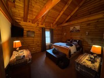 Queen room. This is not the primary suite. (We forgot to get a photo of our room.) Both bedrooms upstairs are very nice.