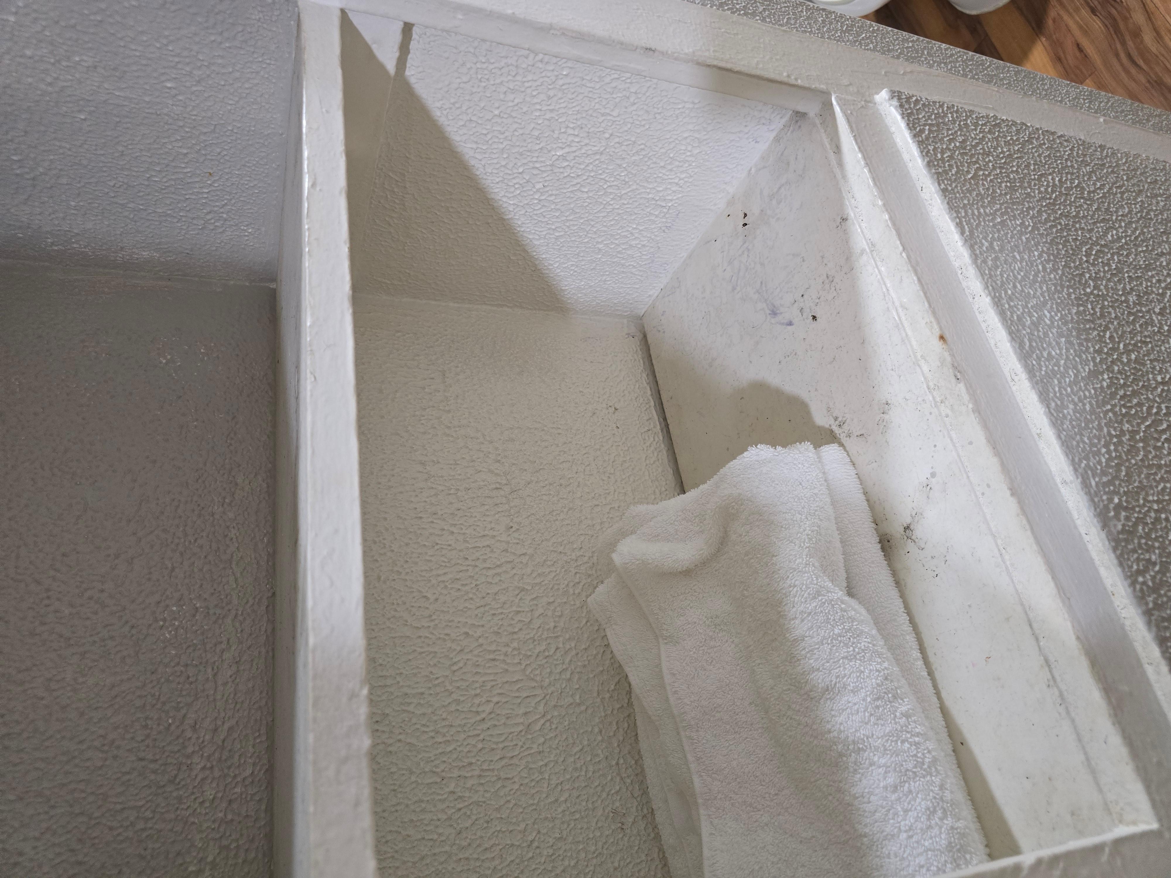 The shelf where bathroom towels were stored.