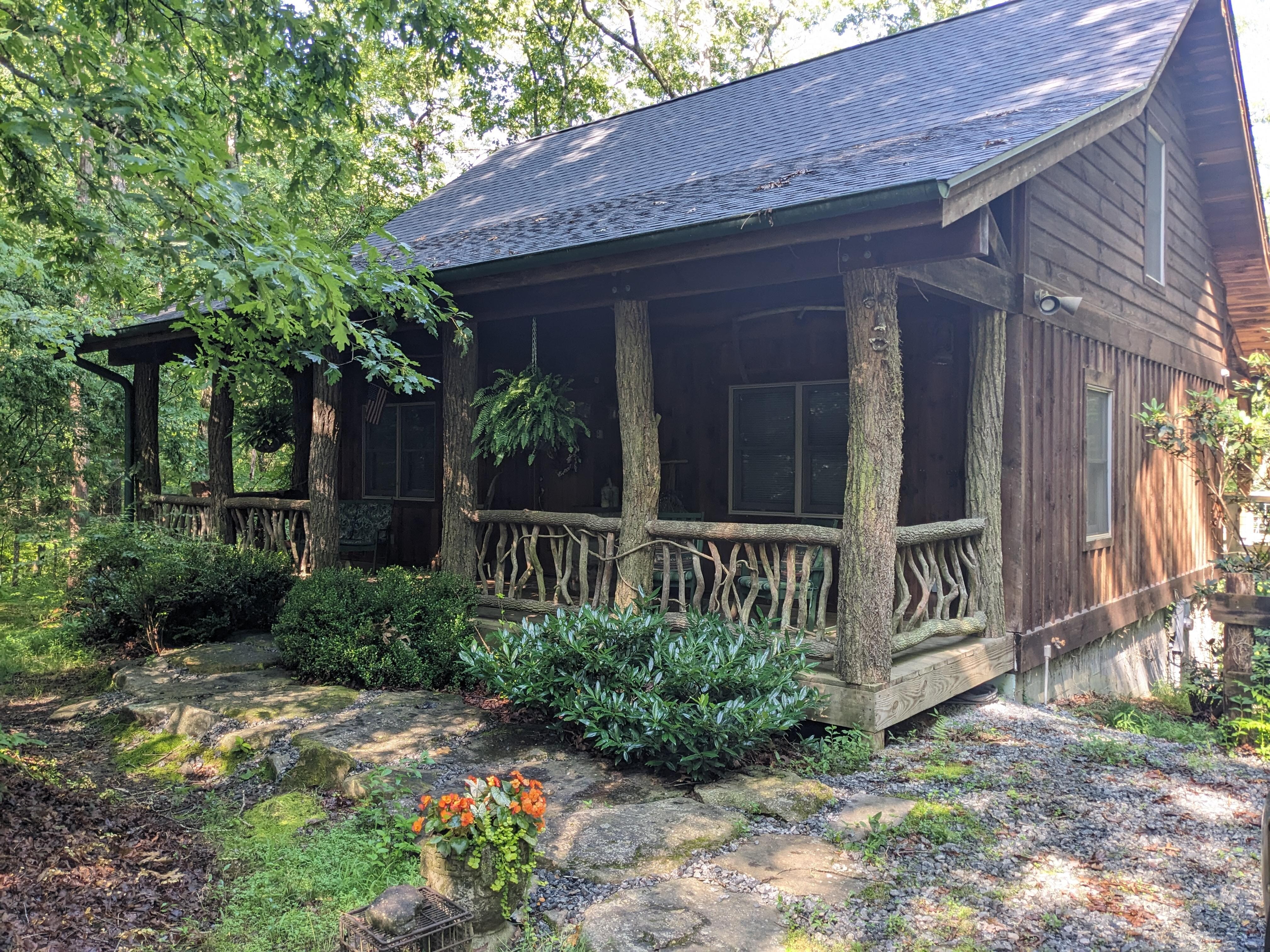 Cabin entrance viewed from driveway/parking area