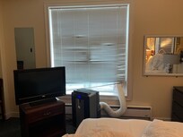 Loud AC, broken blinds, lots of extra light at sunrise.