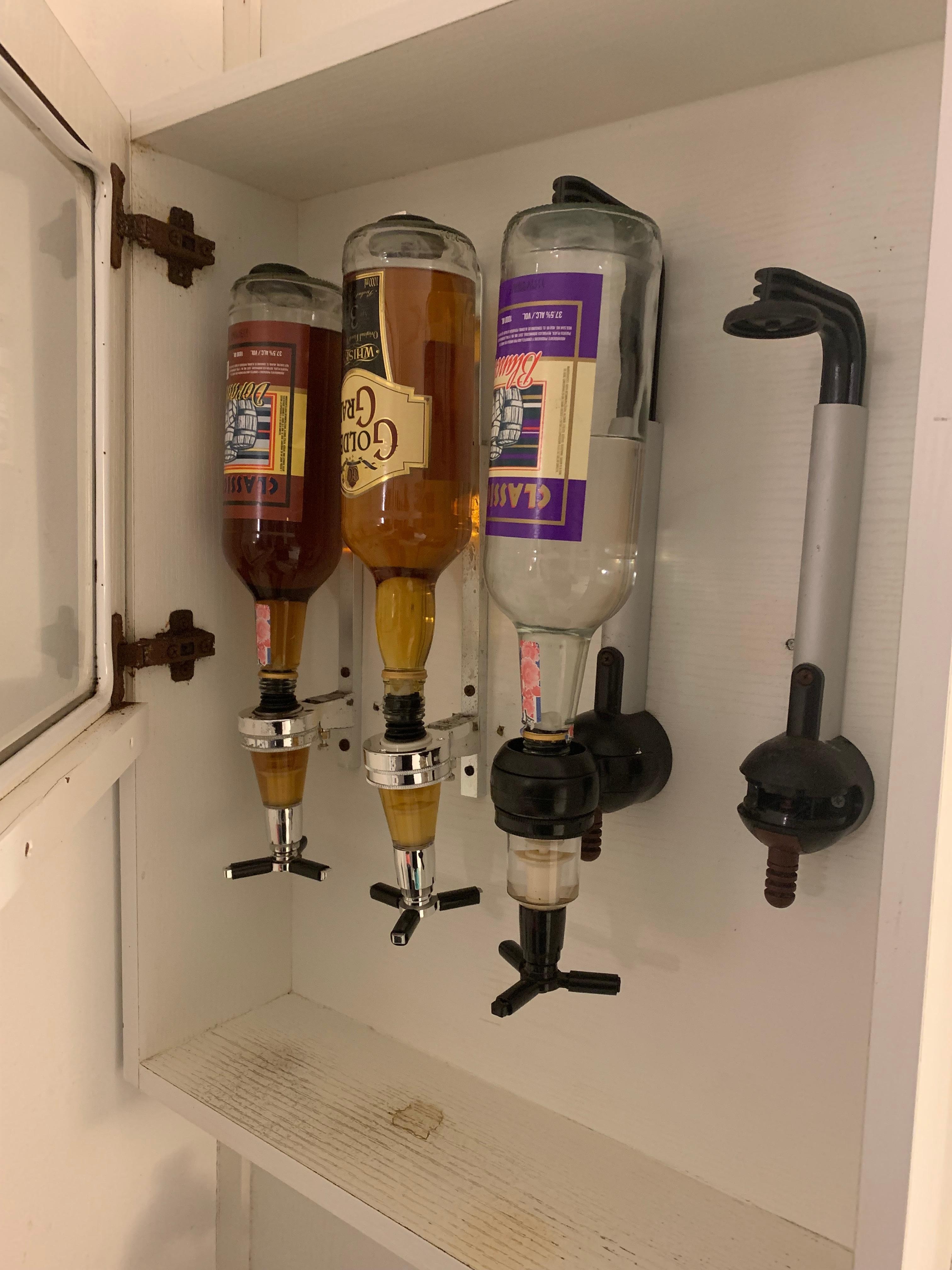 Alcohol dispenser broke and door broke