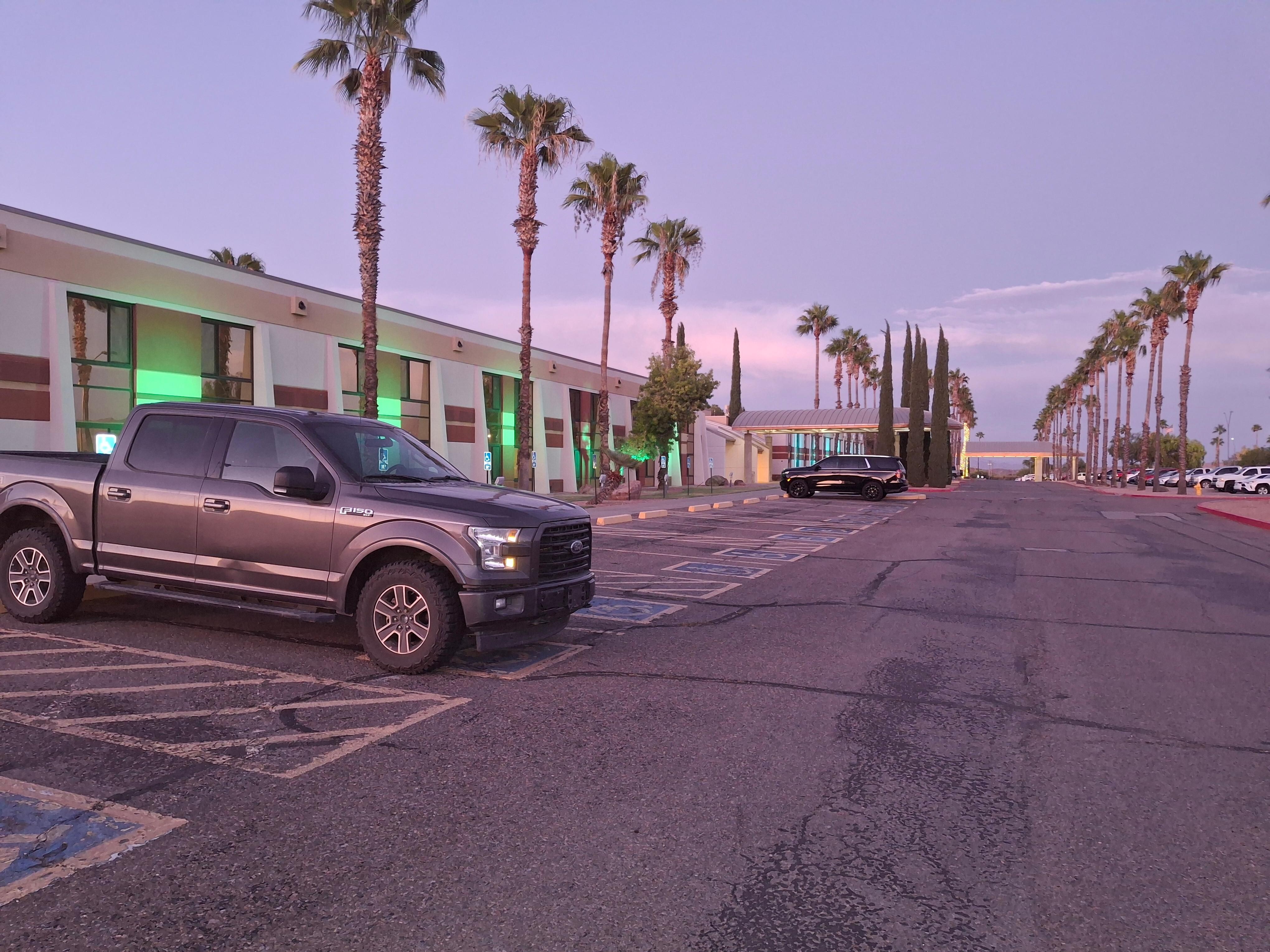 The hotel is on the far end of the site.
