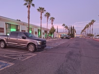 The hotel is on the far end of the site.