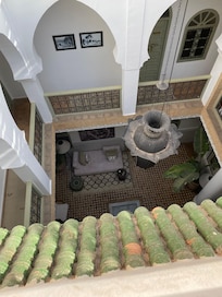 Looking down from the rooftop into the Riad