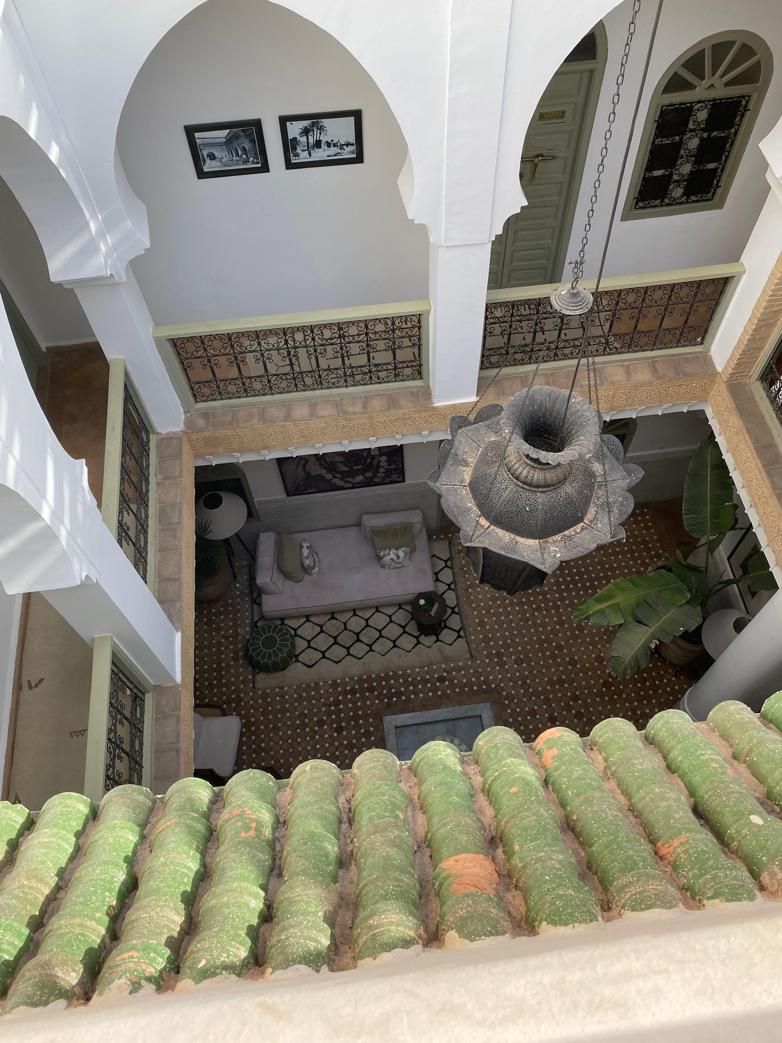 Looking down from the rooftop into the Riad