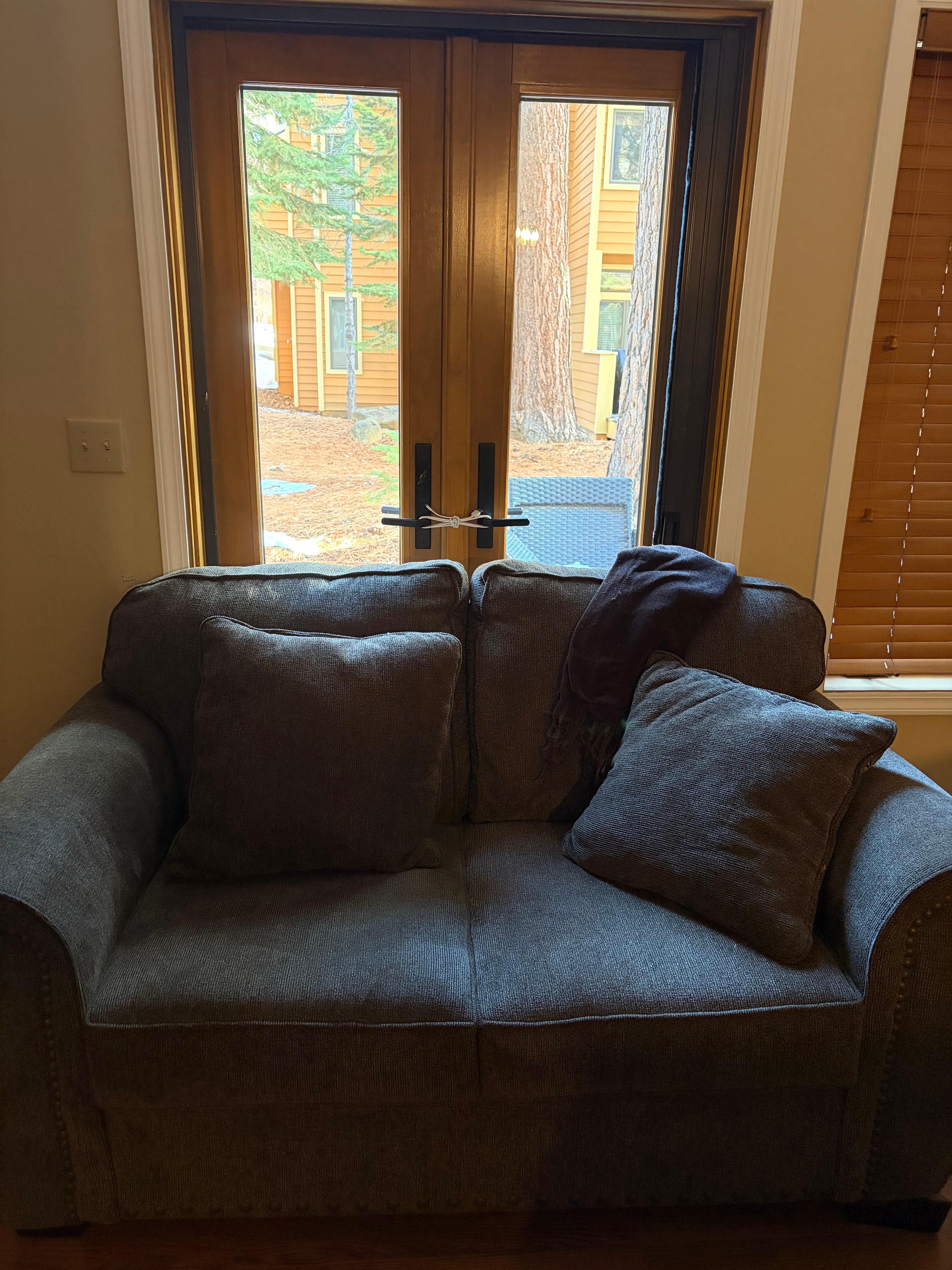 This door didn’t lock & no one came to fix it.I had to wrap cords around the door knobs.There’s also no curtain so you visibly can see inside from outside. We pushed the couch in front of the door as well.There’s a screen that doesn’t close also. 