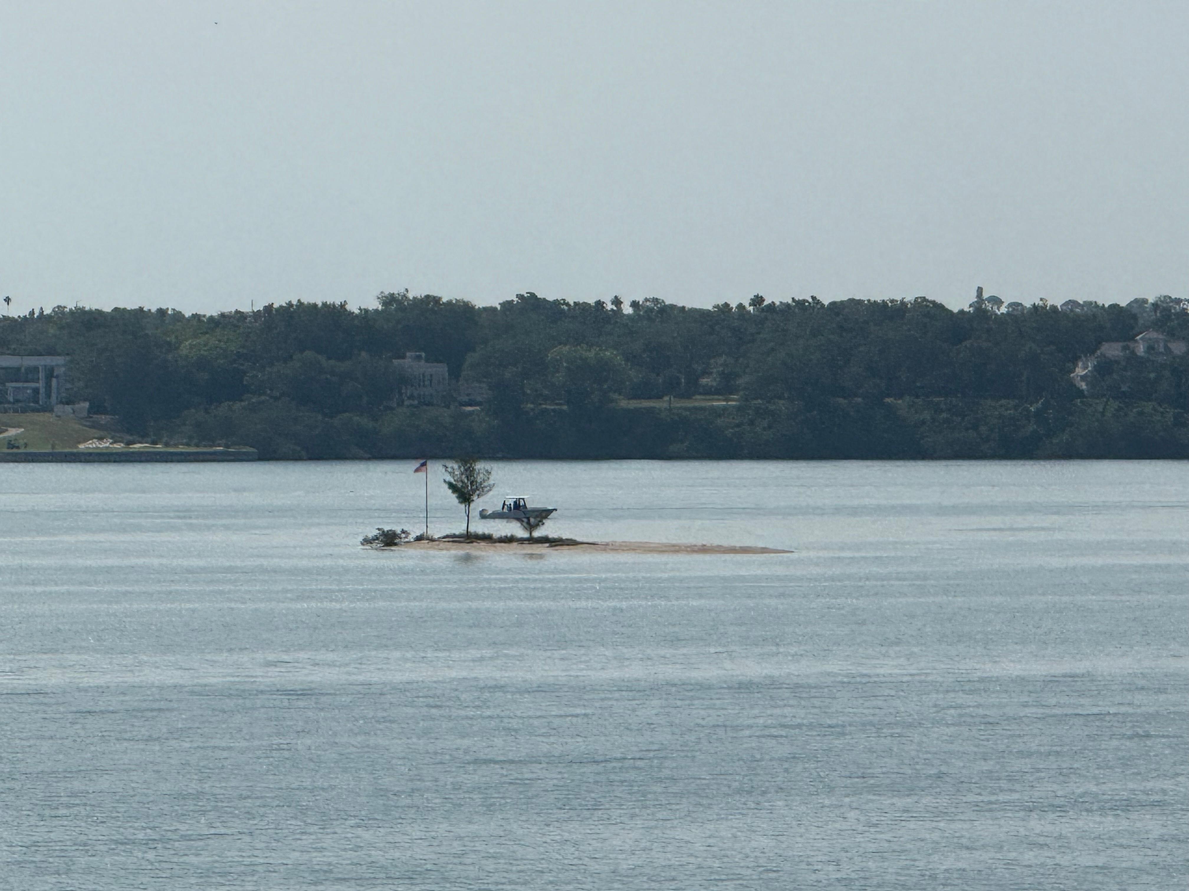 Small Island on the water way in front 