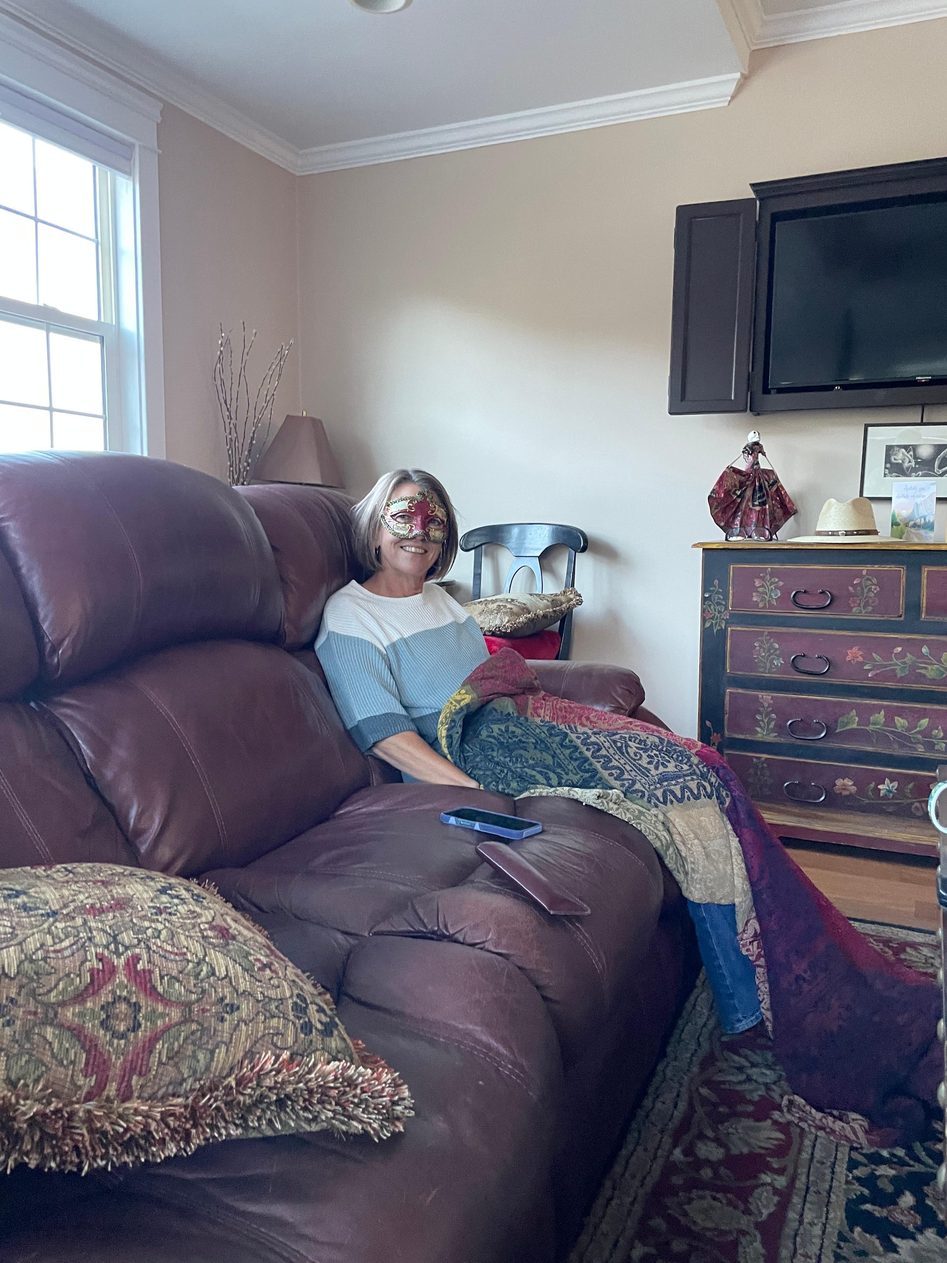 One of the birthday girls wearing a decorative mask early one morning. 