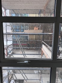 Scaffolding view and loud construction noise first thing Saturday morning