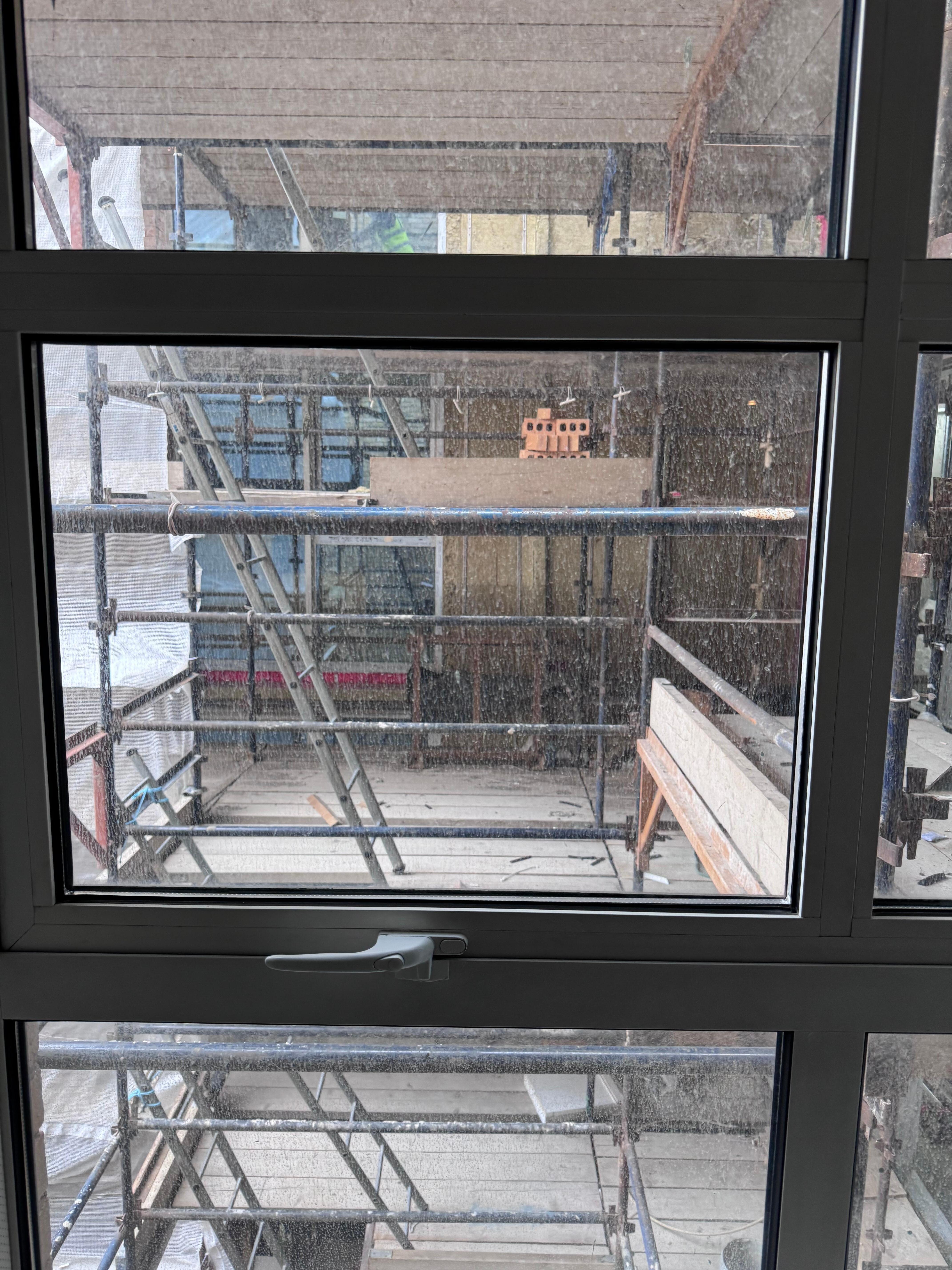 Scaffolding view and loud construction noise first thing Saturday morning 
