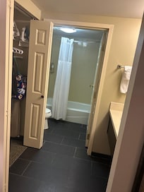 Closet, sink and bathroom area of our room