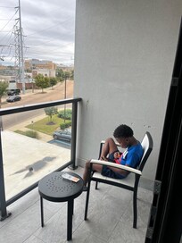 My Son enjoying the view on the beautiful balcony