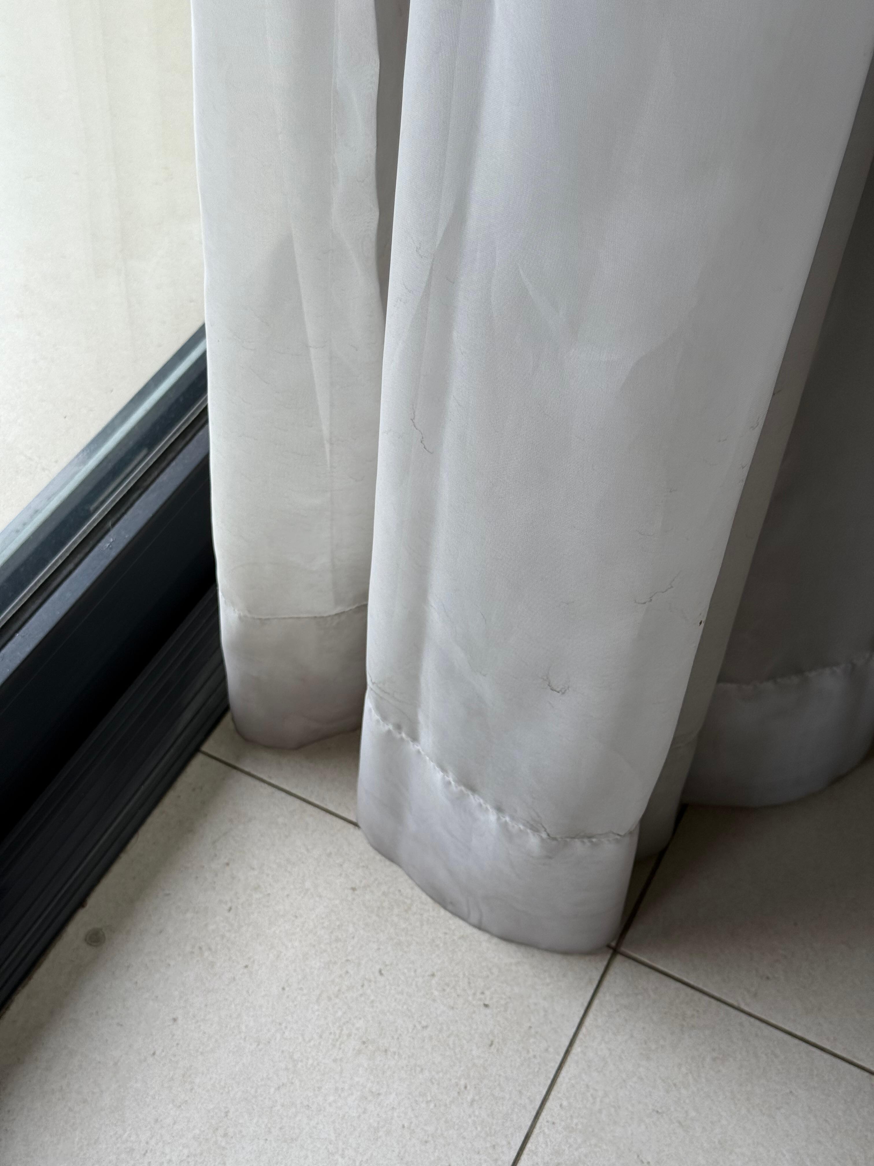 Dirty curtains.