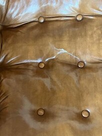 Ripped living room chair