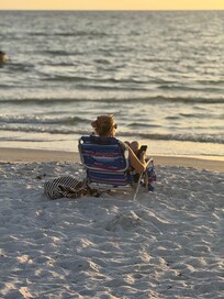Watching the sunset. All chairs and beach supplies were provided.