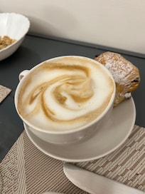 Breakfast cappuccino and pastry
