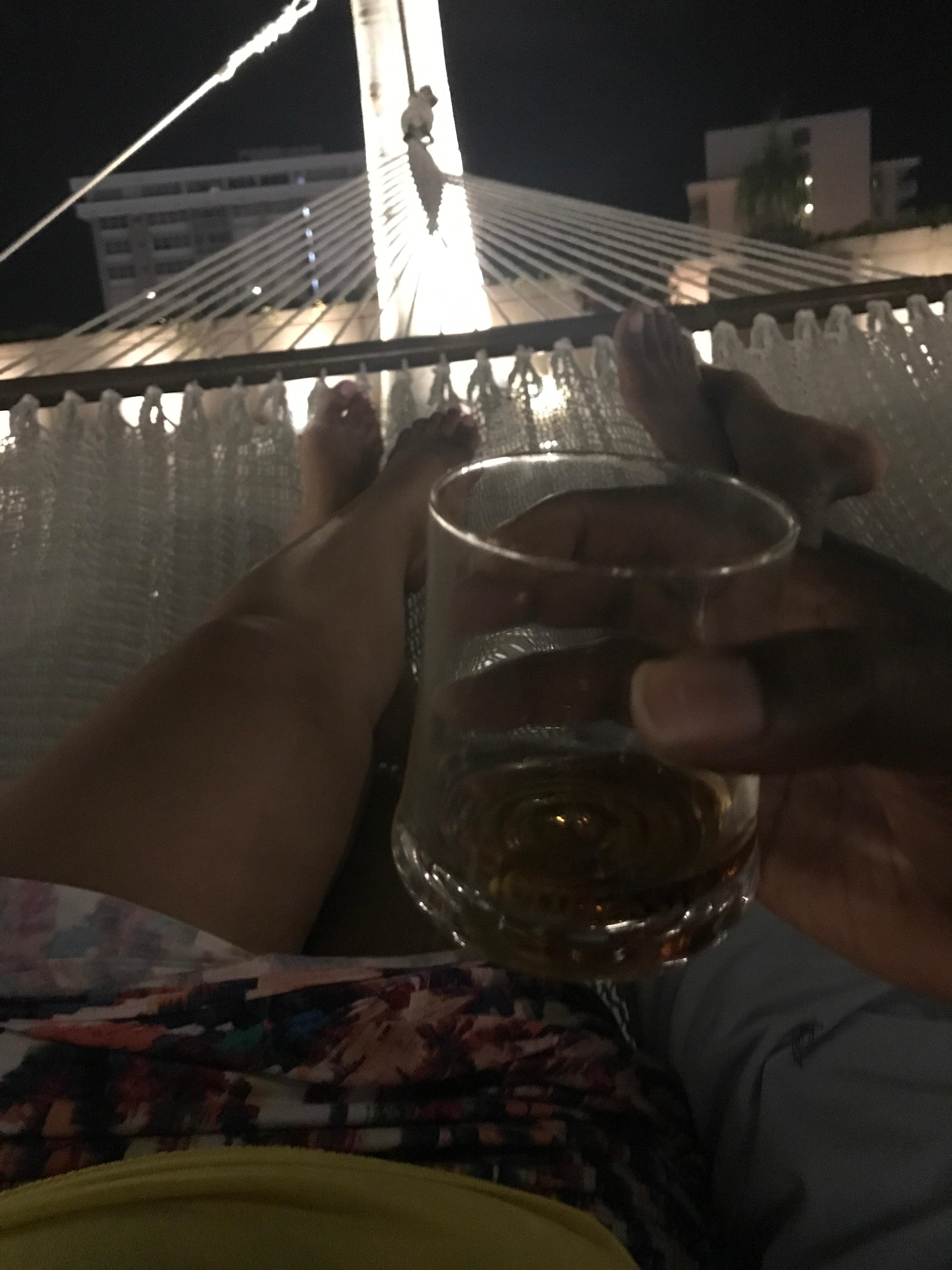 Hubby and I relaxing in a hammock by the pool