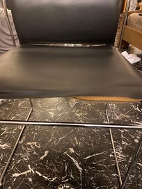 Chair not fit to sit in. And ripped.