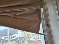 Broken blinds full of dust