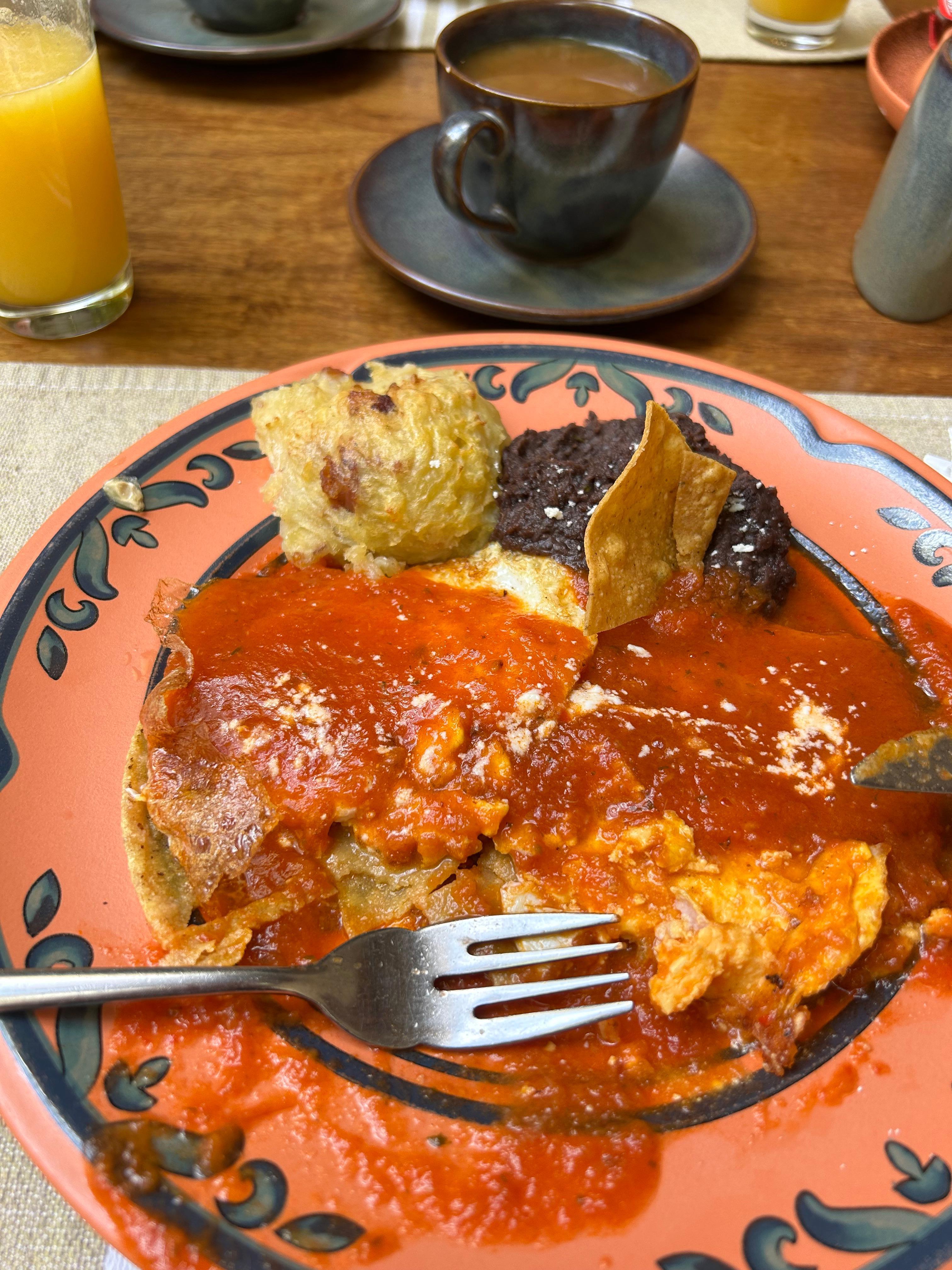 Perfect huevos rancheros with coffee, juice and coffee toast - incuded with room