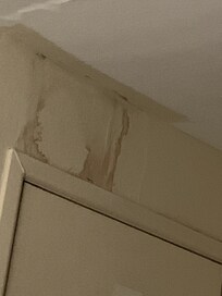 Above entry door in room