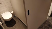 The WC and the only and common sliding door. Close it and the shower room is open!