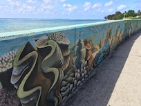 Be sure to take a stroll along the nearby sea wall - the very long mural is wonderful!