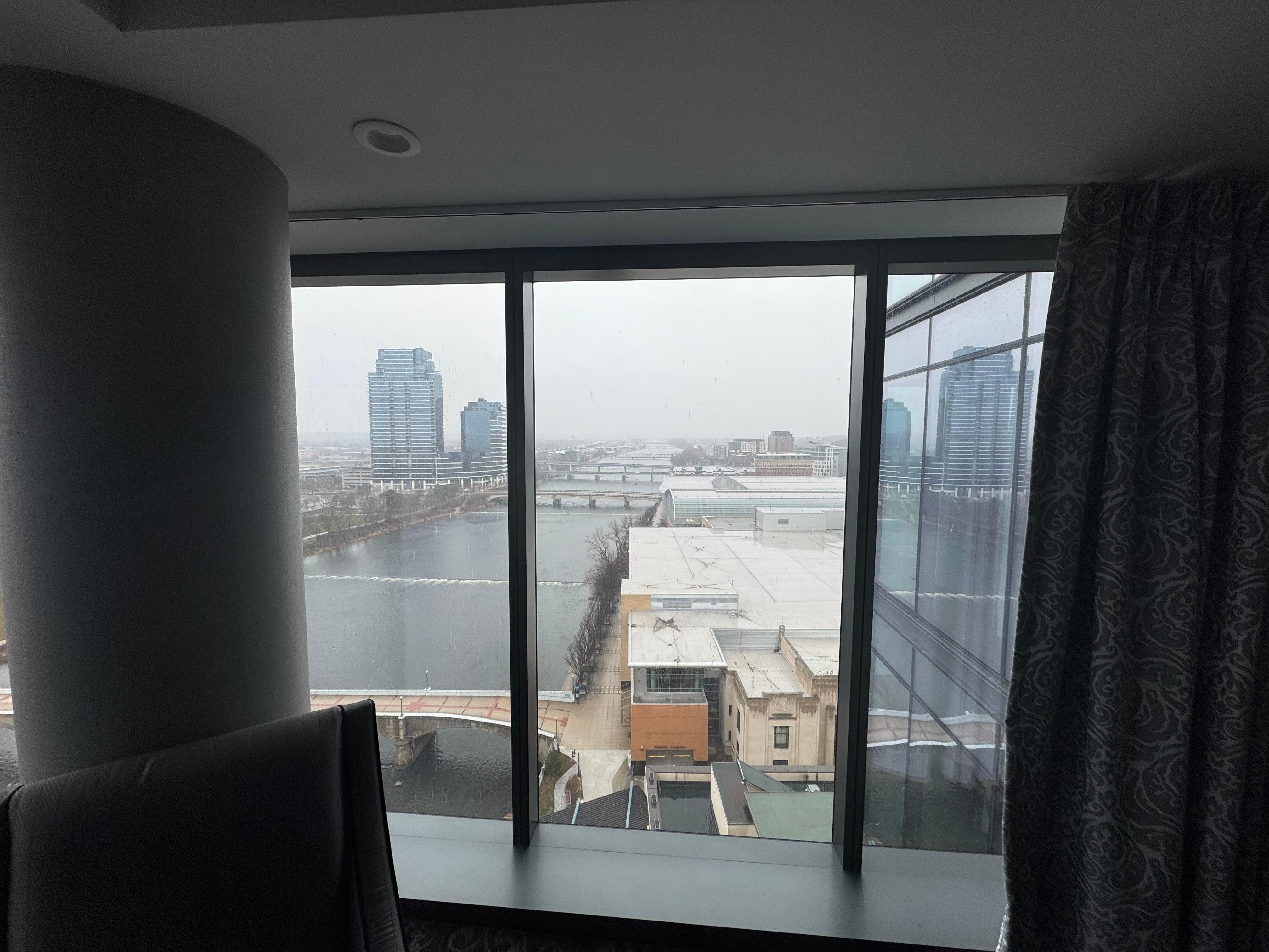 Corner room with floor to ceiling windows overlooking the river.