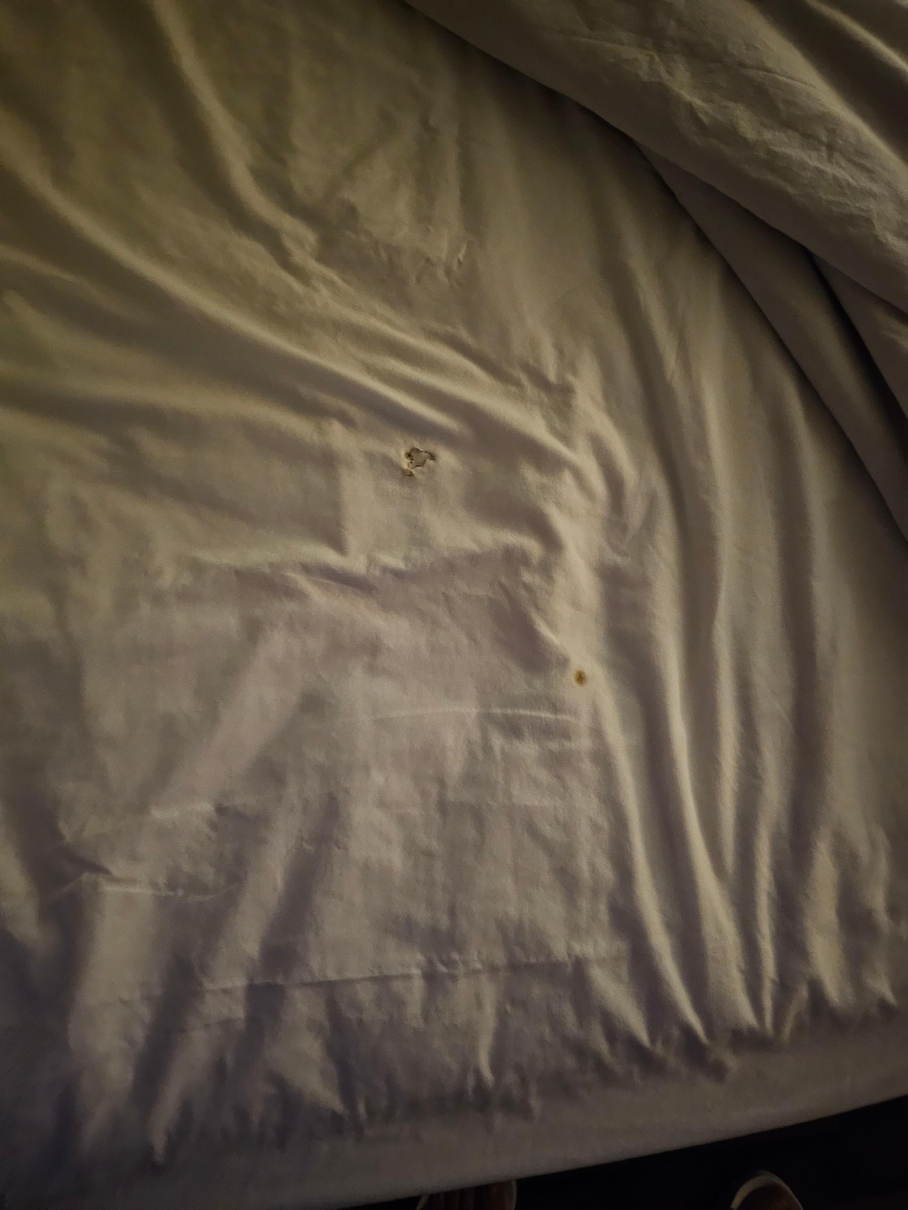 sheets with burn holes