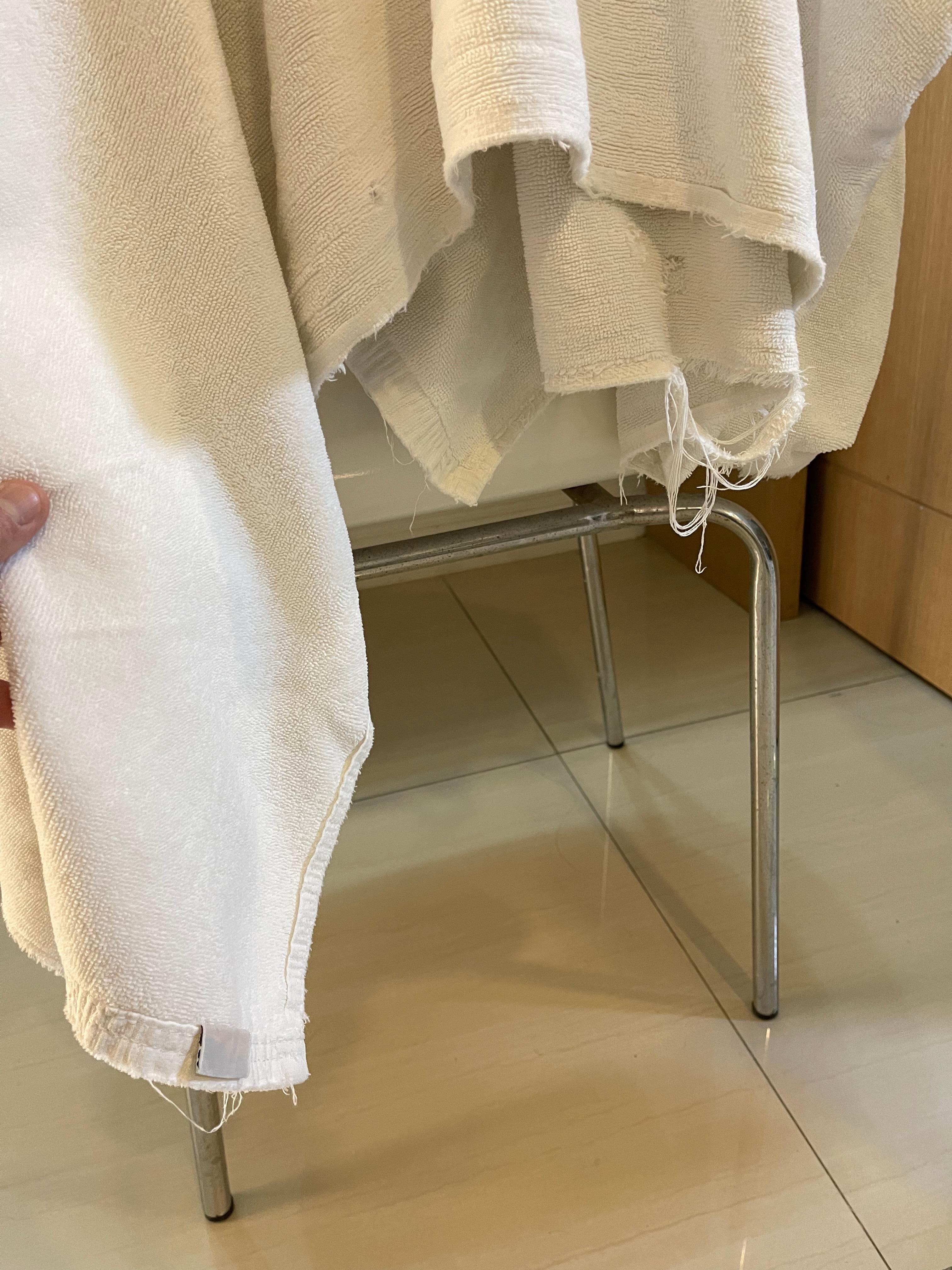 Towels are so worn, they are literally falling apart