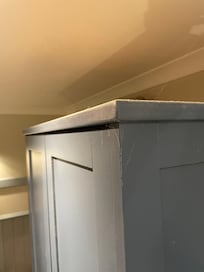 Dust on top of wardrobe