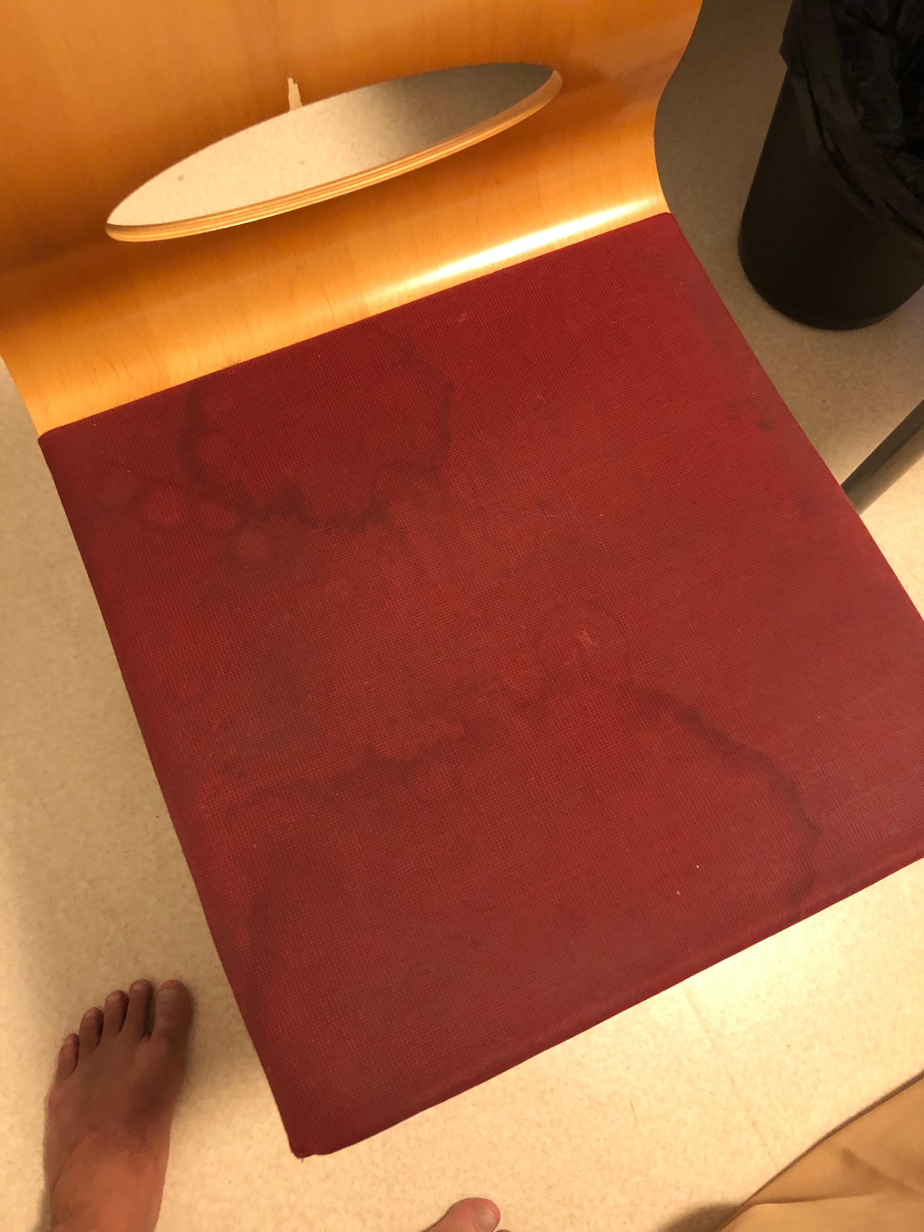 Chair in the room, unidentifiable stains
