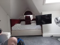 Small Double bed set in eaves.