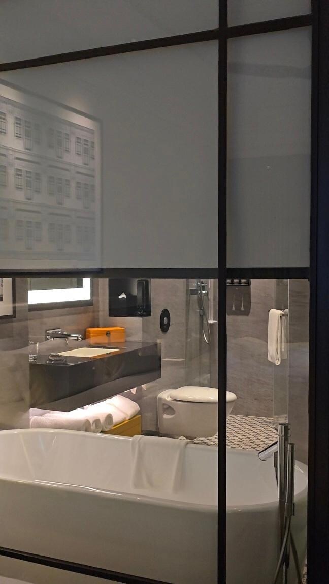 Restroom with privacy screen.