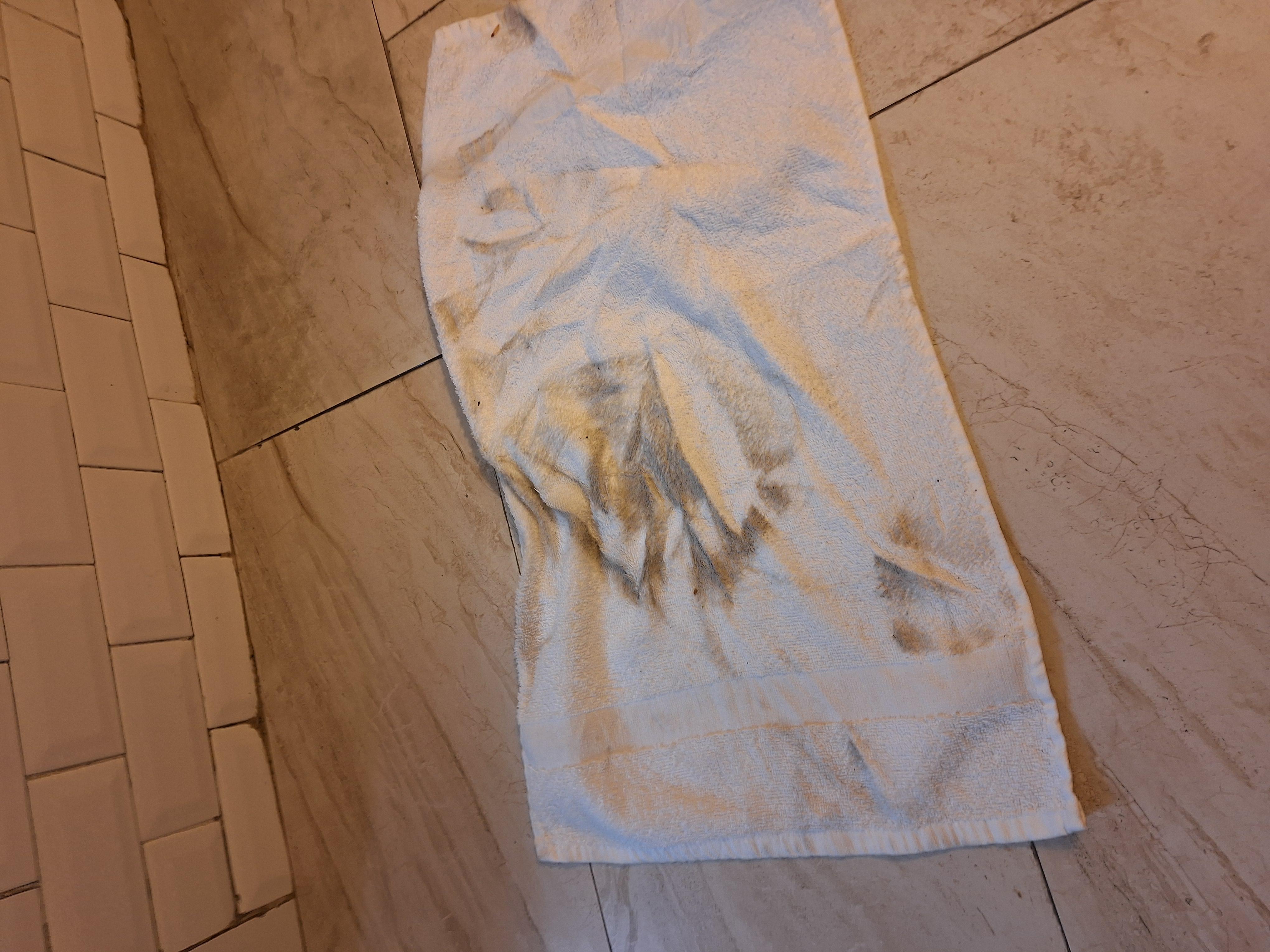 Towel after wiping a single water spot off the floor.