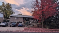 Front of the house, it has a huge backyard with lots of seating options