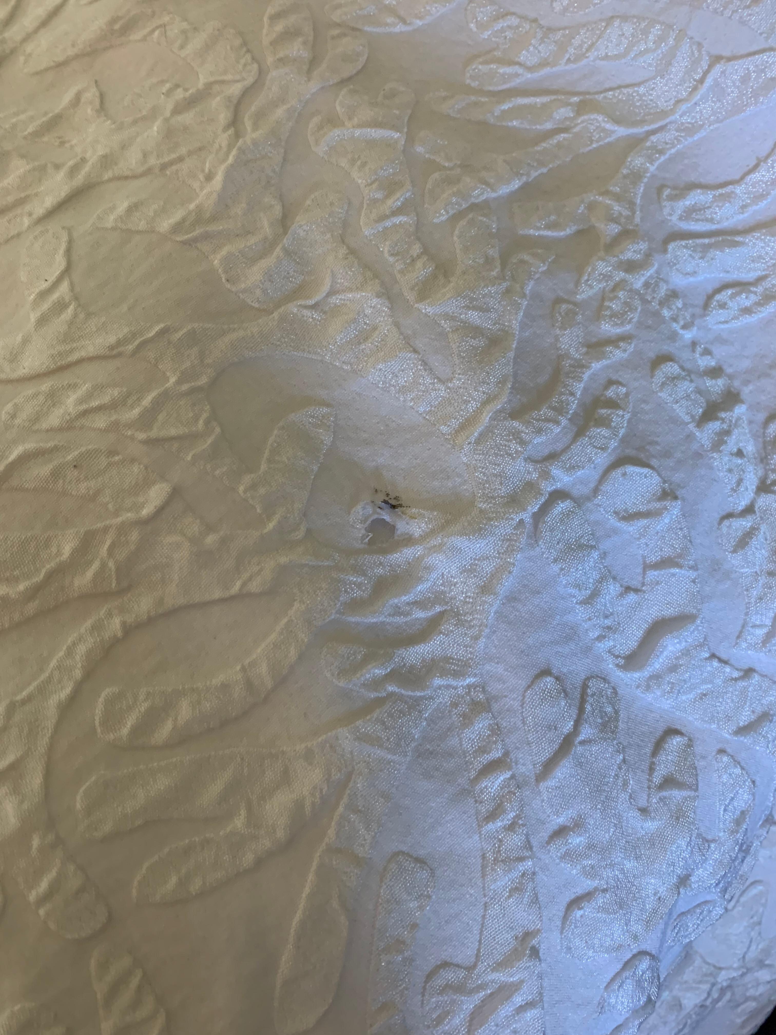 Burn marks In bedspread