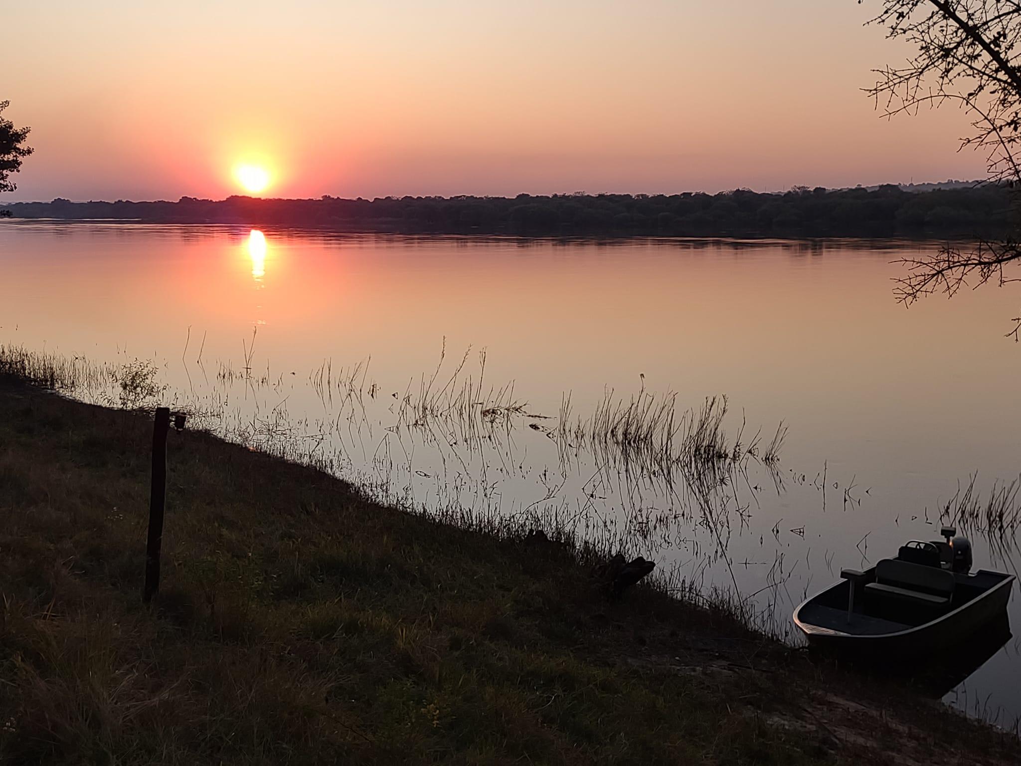 Watching sunset from the hotel's restaurant overlooking the Zambezi River