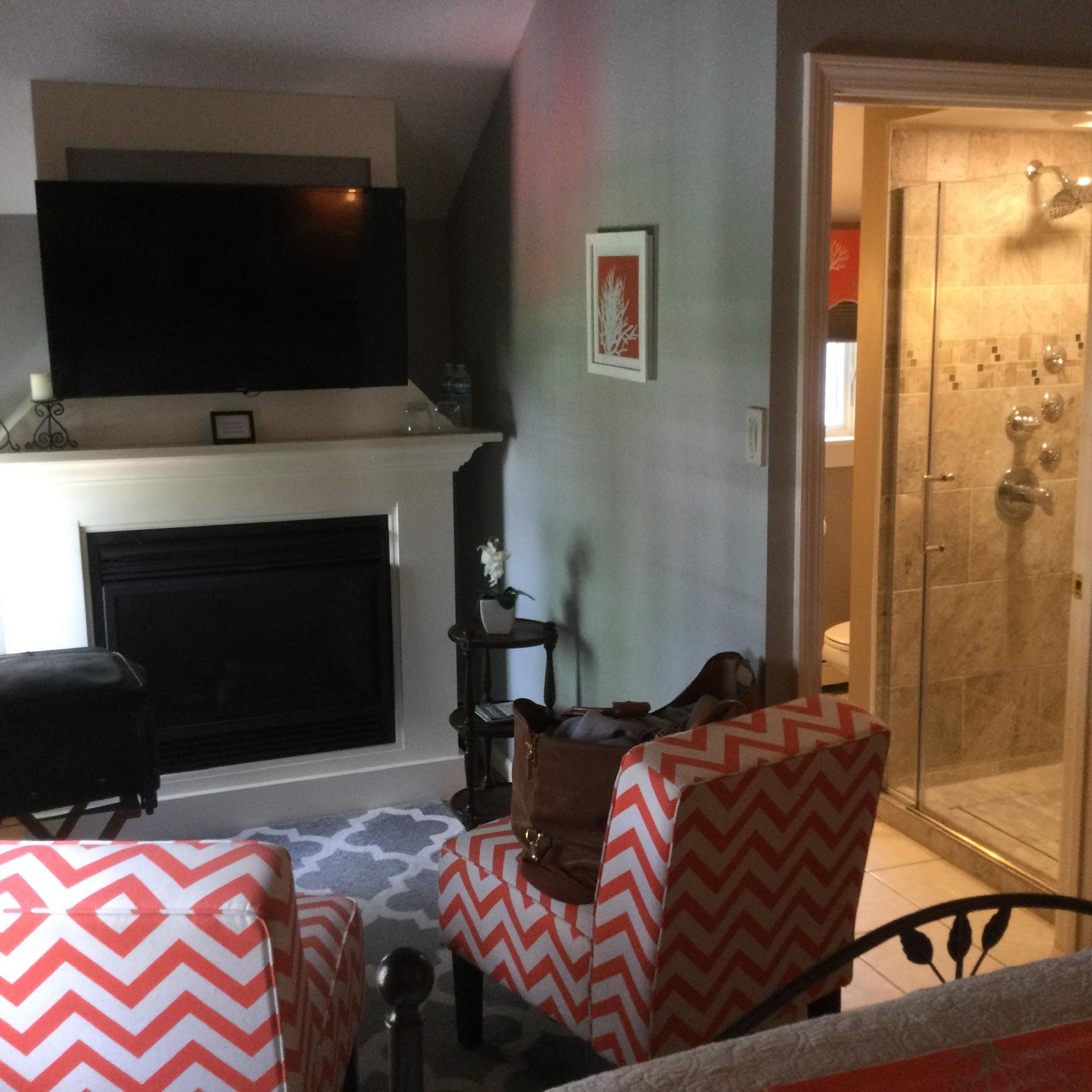 Our sitting area in the bedroom next to the fireplace! Great kick back and relax area! 