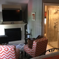 Our sitting area in the bedroom next to the fireplace! Great kick back and relax area!