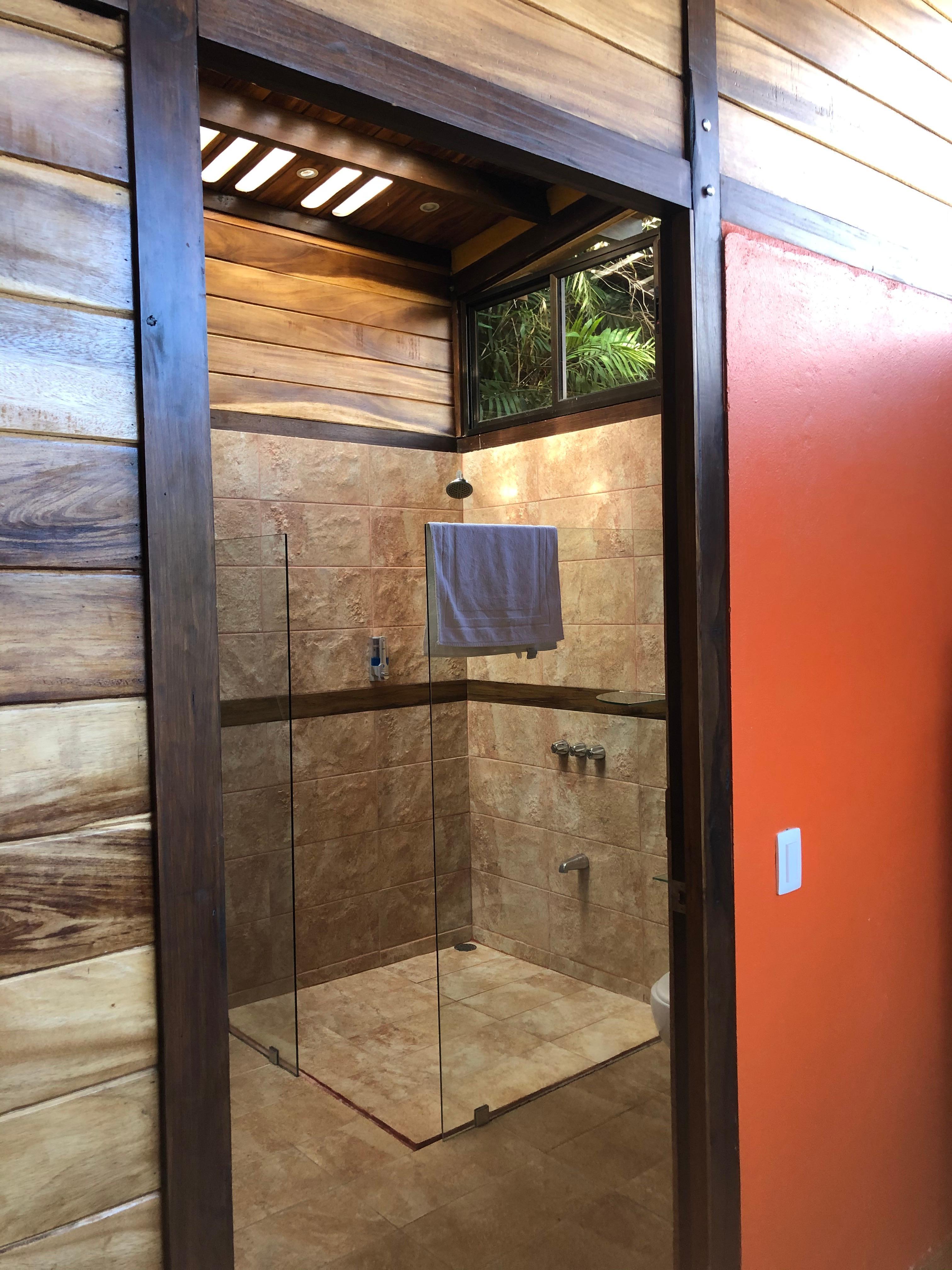 Bathroom with a skylight and a lovely shower! Also a large closet/storage area that was very useful.