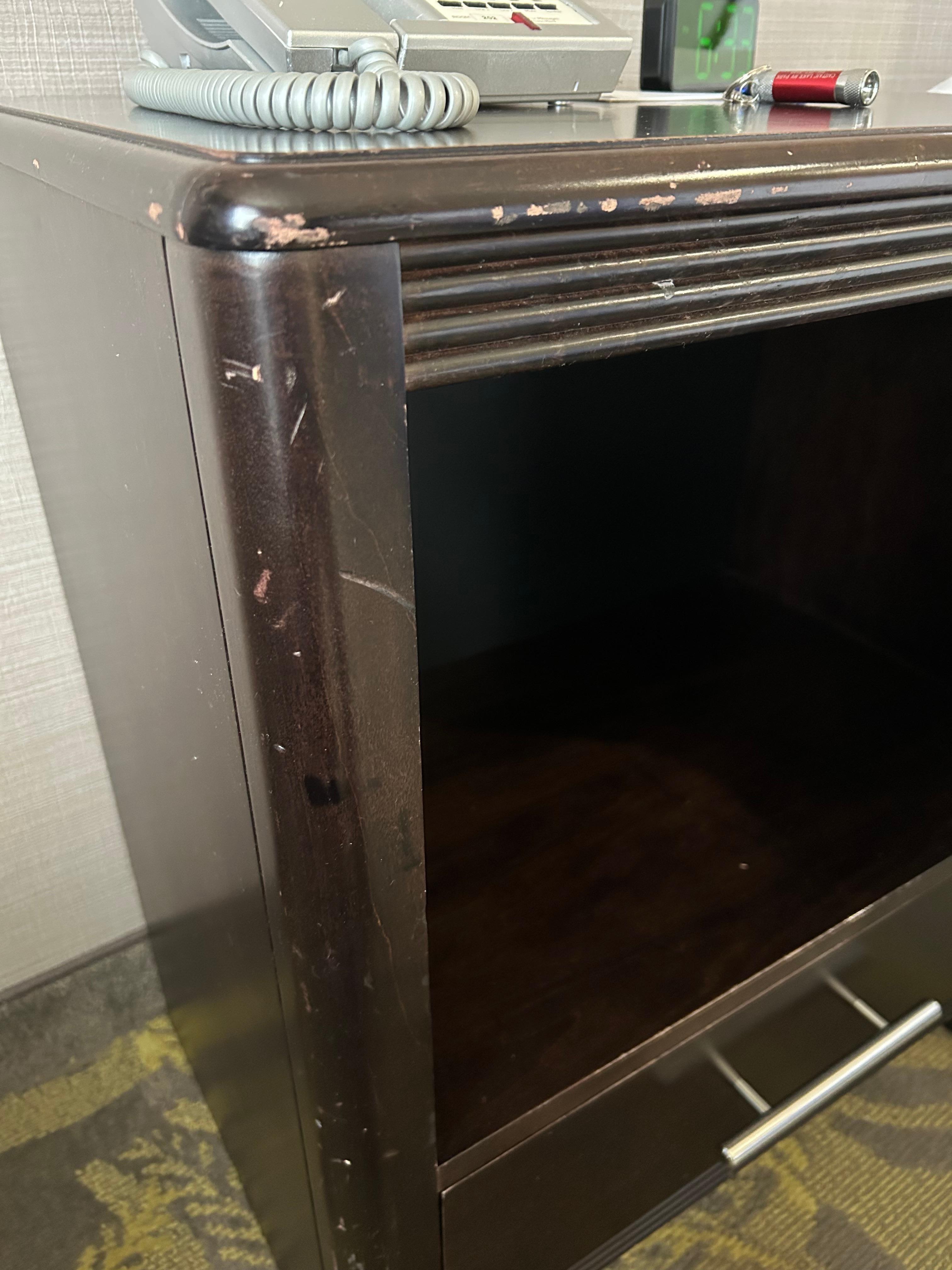 Chipped and scarred furniture. 