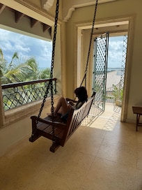 This swing situated right in the outdoor dining room was so relaxing at all hours of the day.