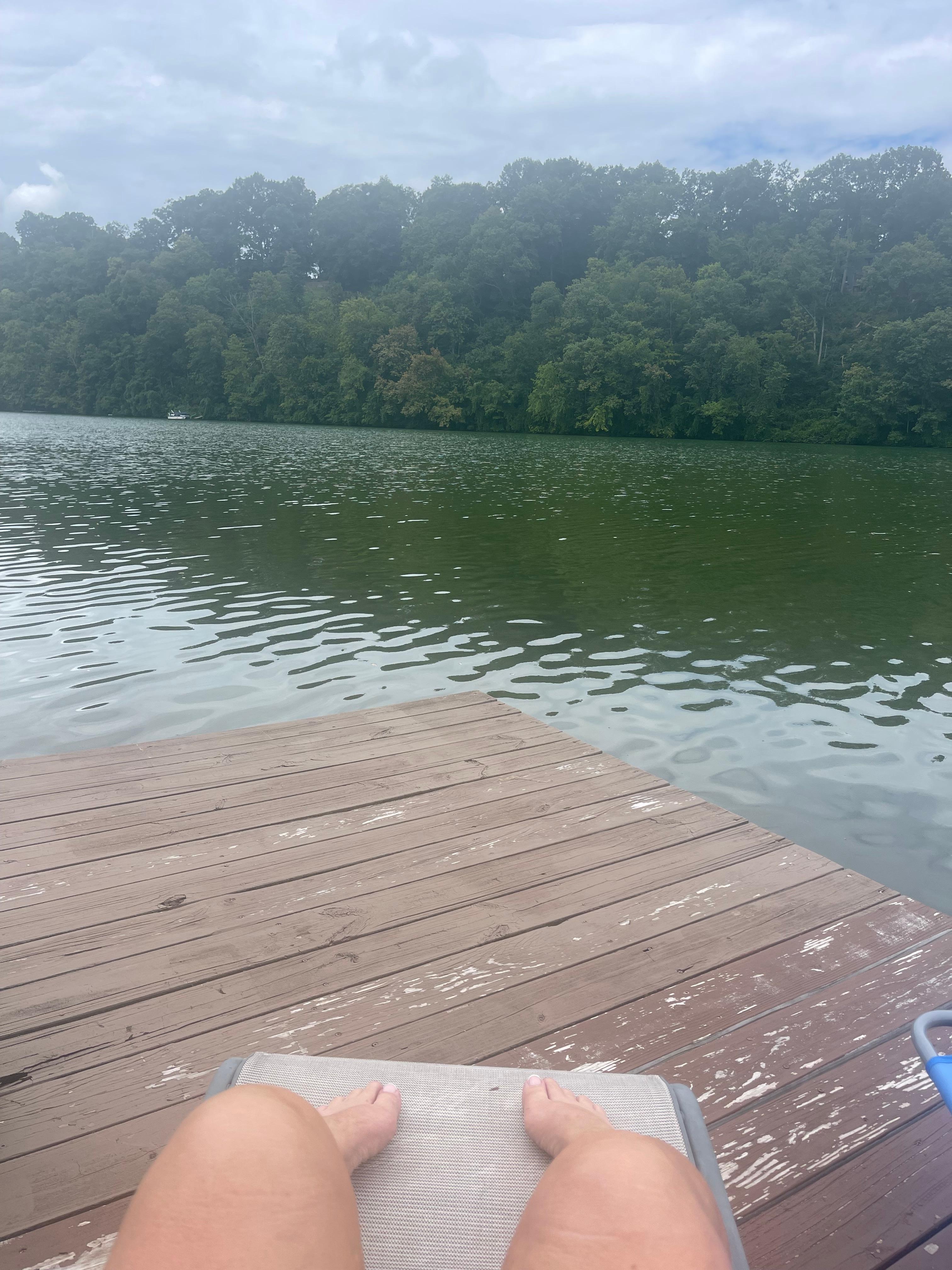 Enjoying the sun with a good book and wine