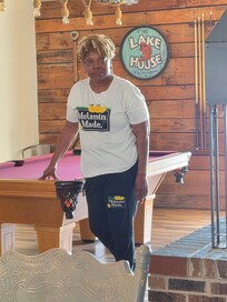 My wife standing in the pool area.