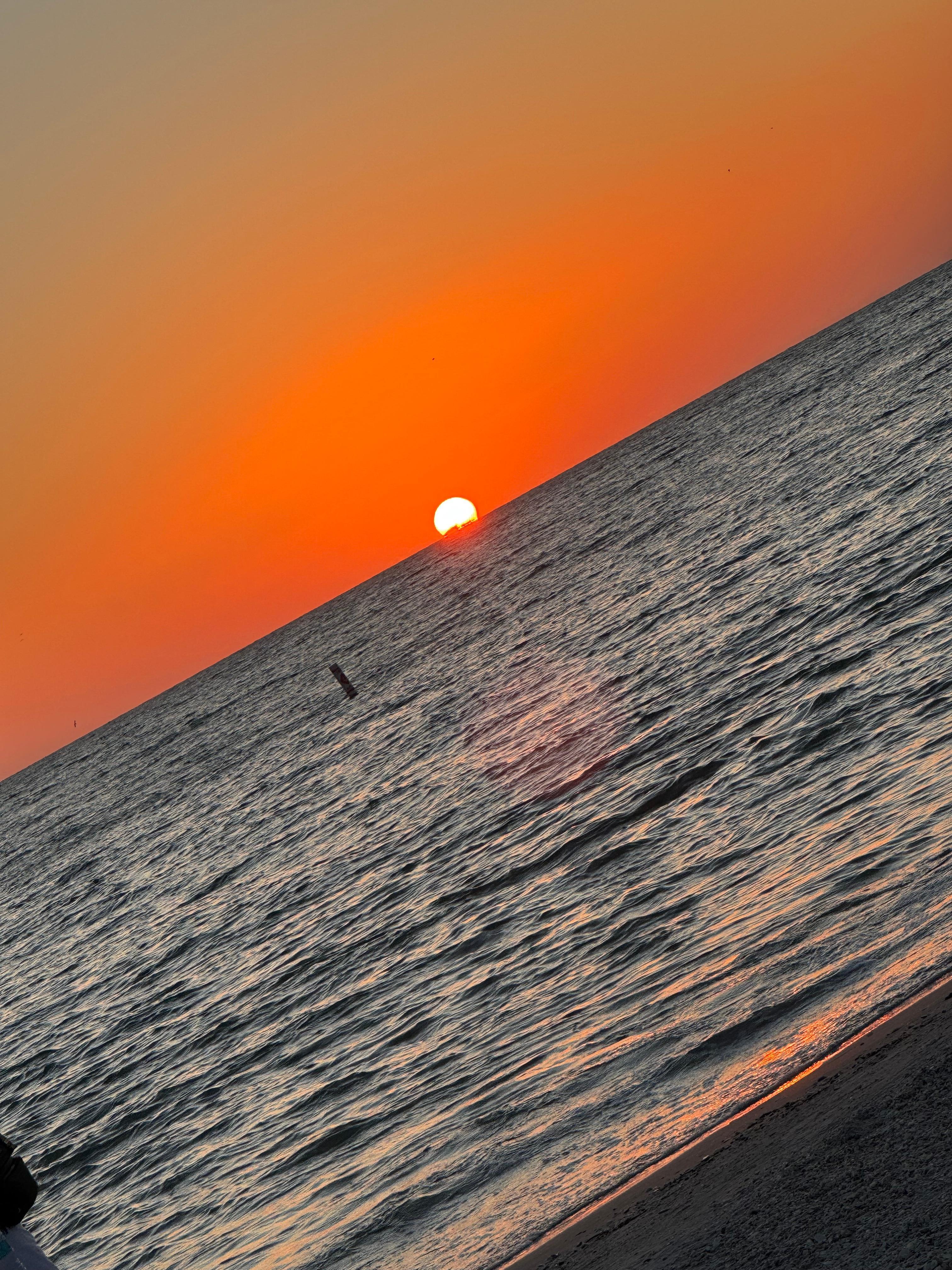Sunset on the beach out front of condo