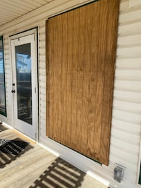 Boarded up window.
